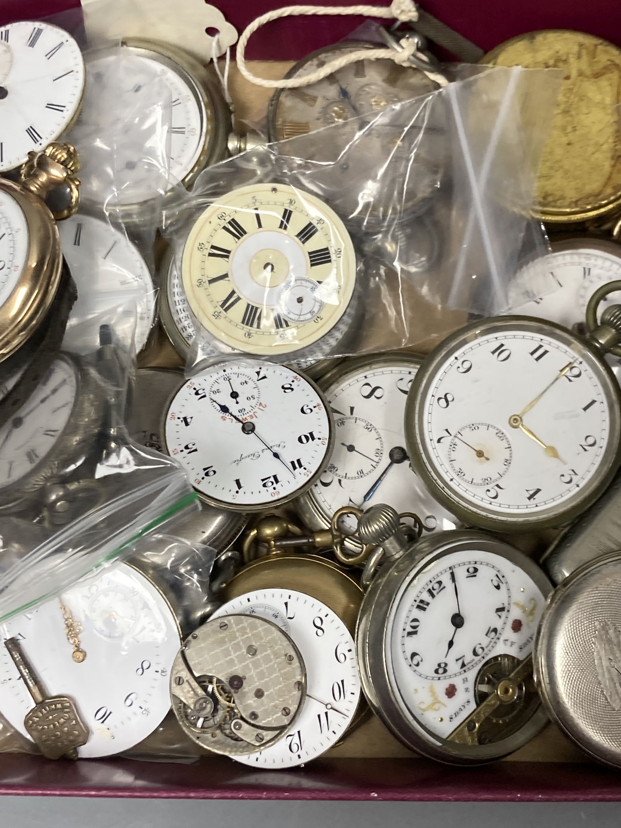 A group of assorted bass metal pocket and fob watches and a small quantity of movements.